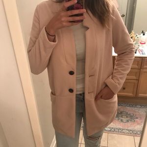 Soft pink tailored jacket with pockets